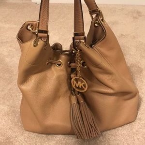 Michael Kors purse with tassel